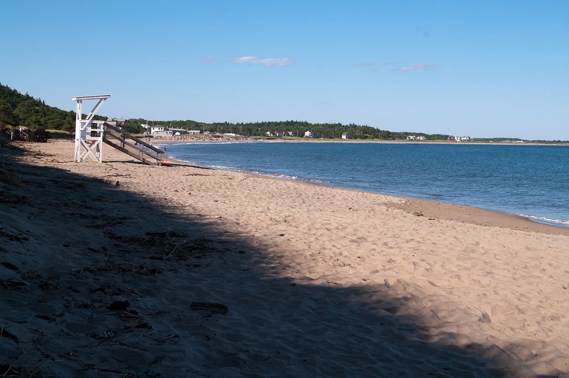 Popham Beach State Park on a calm summer day, lifeguard chair in place. The 2026 lifeguard season ended on 30 August, so the shoulder season is unwatched.