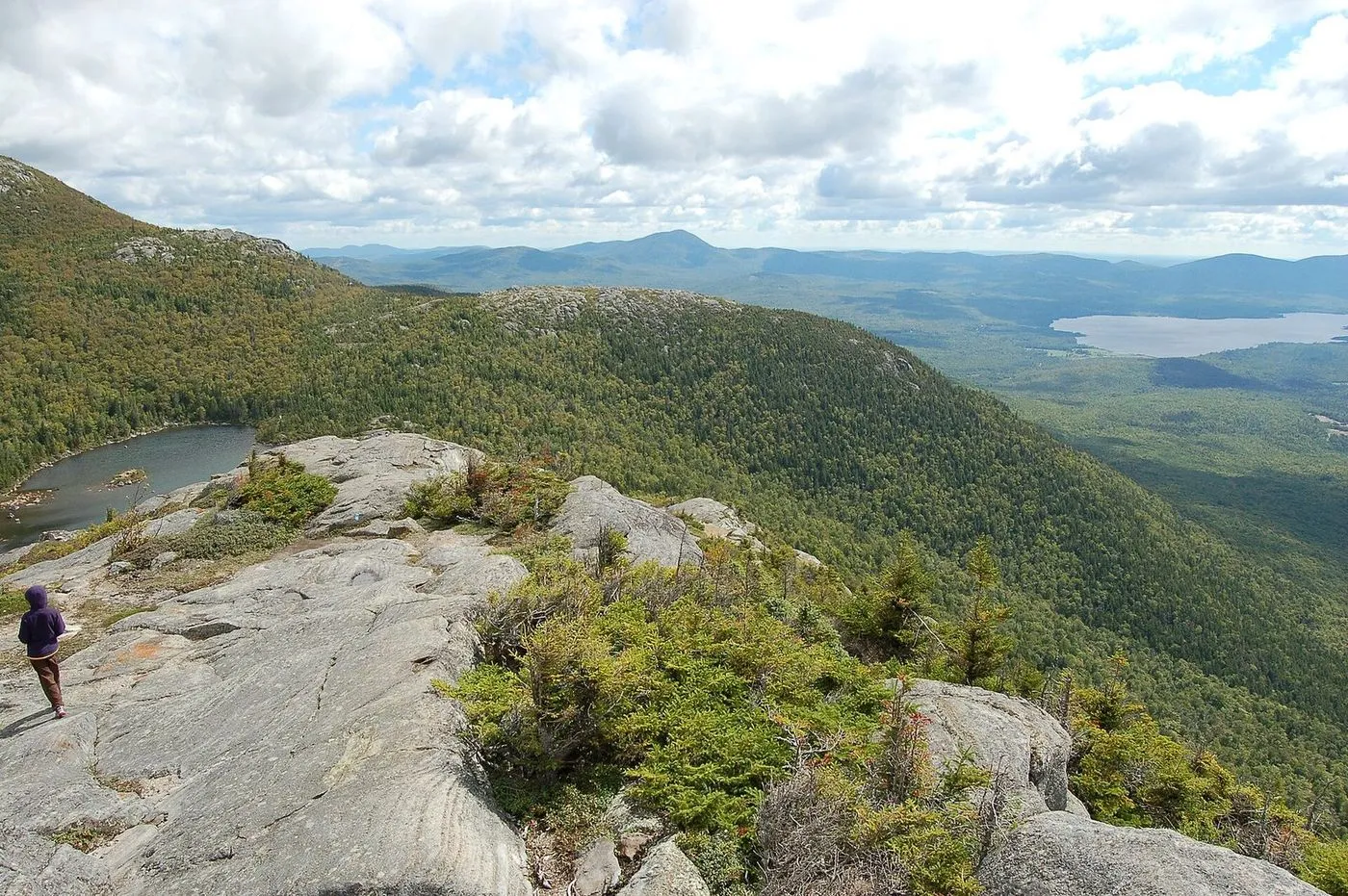 Open granite at the top of Tumbledown, with Tumbledown Pond below on the left and Webb Lake in the distance